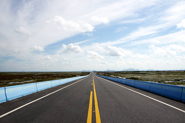 istock Empty road and the traffic lines. 467103119