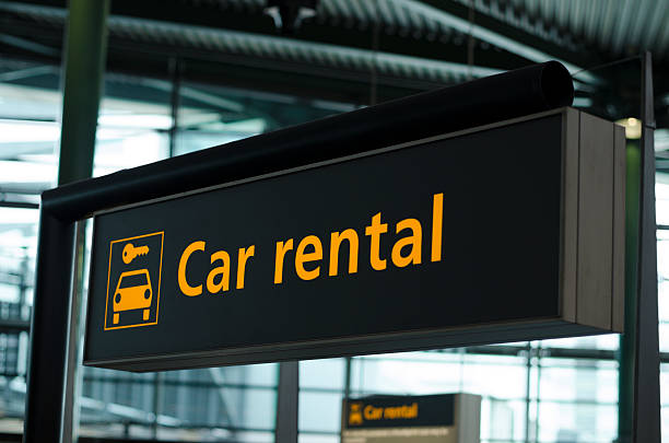 Car rental sign Sign with direction to car rental rent a car stock pictures, royalty-free photos & images