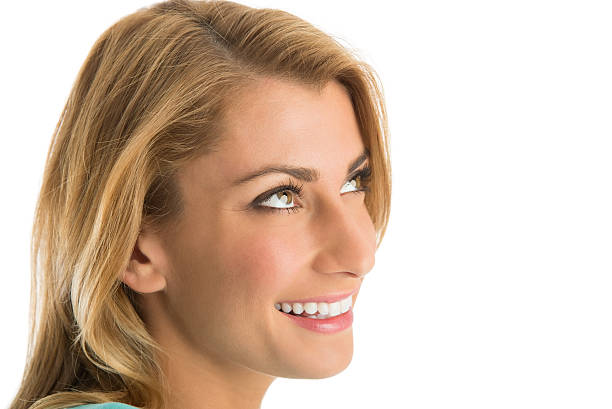 istock Happy Woman Looking Up At Copy Space 467103911