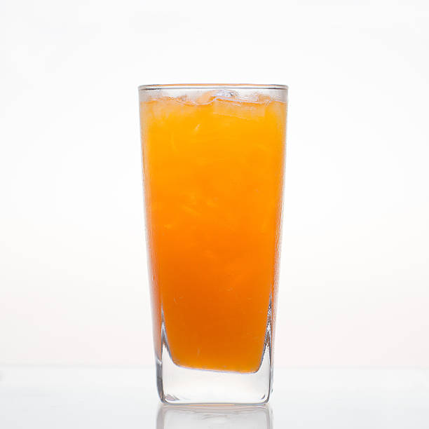 istock Fresh orange juice with ice in glass isolated 467104470