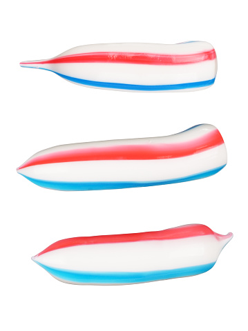 Extruded toothpaste isolated on white background. With clipping path
