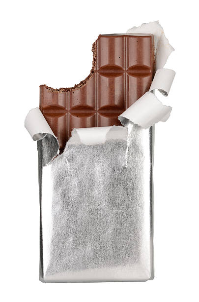 istock Partially unwrapped chocolate bar with bite taken from it 467104758