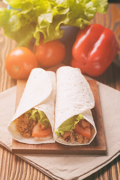 istock Fresh tortilla wraps with meat and vegetables 467104928