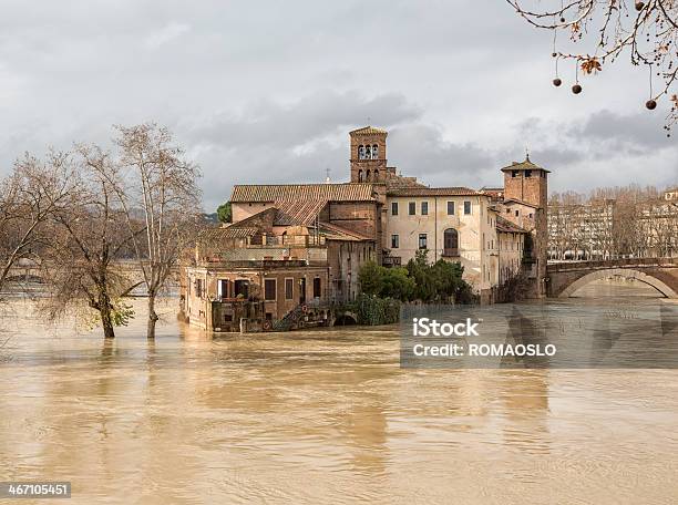 Isola Tiberina And A Flooded Tiber Rome Italy Stock Photo - Download Image Now - Building Exterior, Color Image, Dirty