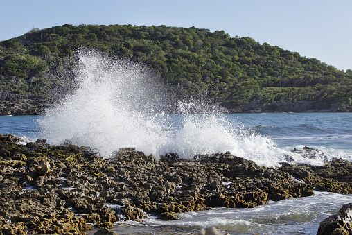 Waves crashing on the rocky shore
