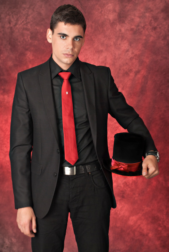 flame Coherent siren Man In Black Suit With Red Tie And Top Hat Stock Photo - Download Image Now  - Adult, Blue Eyes, Elegance - iStock