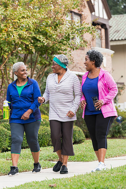 istock Three senior black women exercising together 467112924
