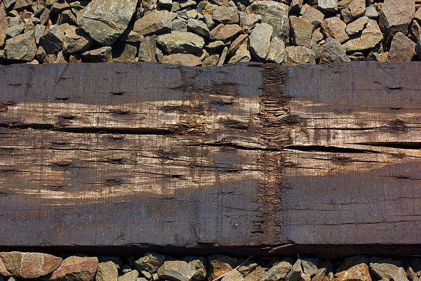 Graphic crosstie and gravel in a railroad track.