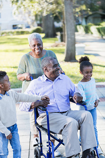 istock Children taking a walk with their grandparents 467113026
