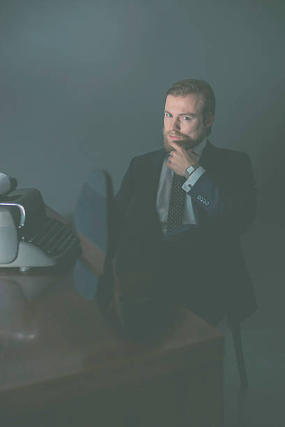 istock Sitting Man in Formal Wear with Feet on the Table 467113132