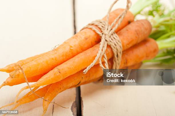 Baby Carrots Bunch Tied With Rope Stock Photo - Download Image Now - 2015, Agriculture, Animal