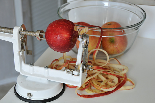 peeling apples for recipe preparation