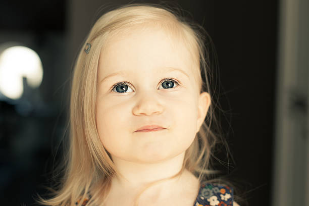 istock Adorable little girl looking up. 467114428