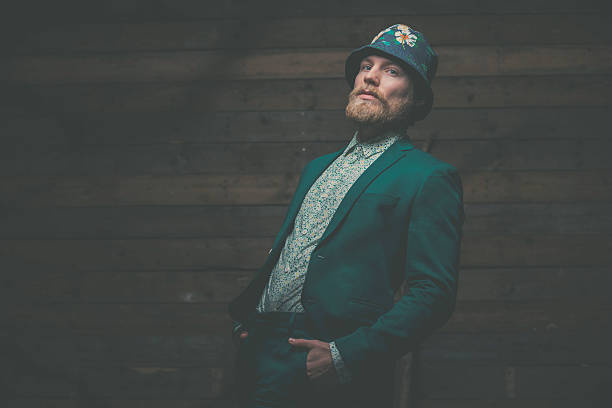 istock Man Wearing Green Business Attire in Leaning Pose 467114564