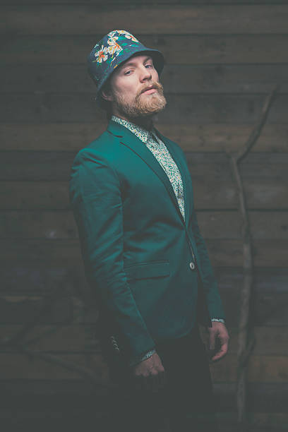 istock Man with Goatee in Elegant Green Formal Outfit 467114576