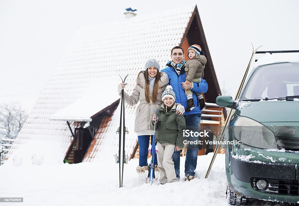 Happy family on winter vacation Happy family on winter vacation in the mountains Car Stock Photo