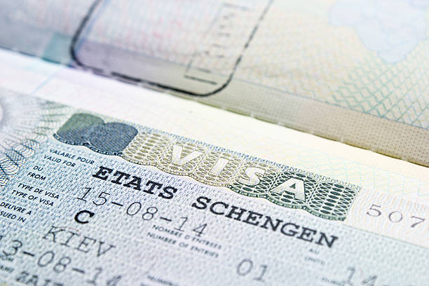 istock Close up Schengen visa in the passport 467117230