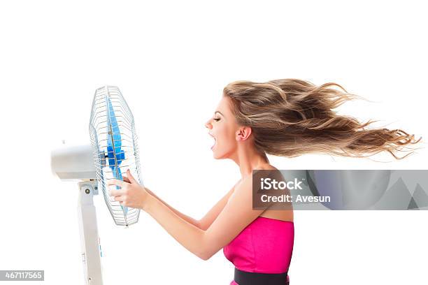Girl With Fan Over White Stock Photo - Download Image Now - Electric Fan, Heat - Temperature, One Woman Only