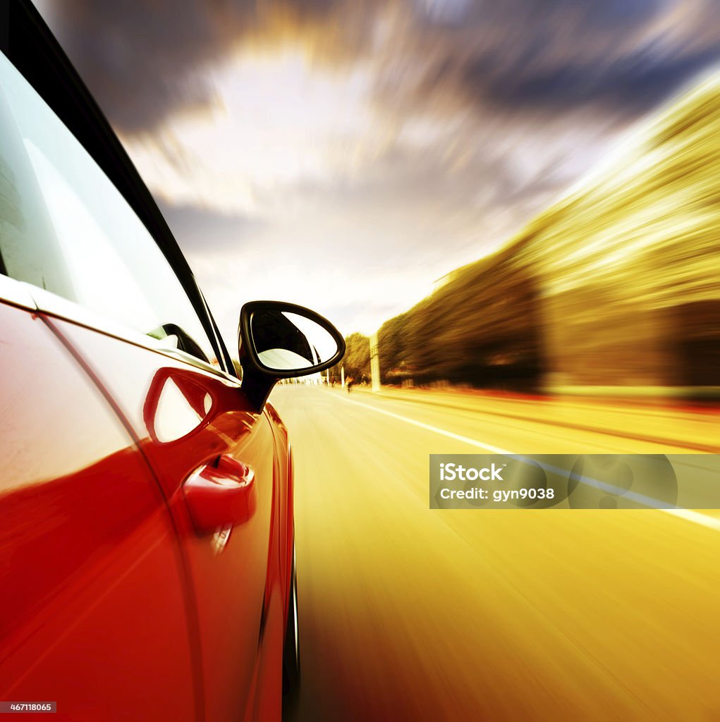 Night, high-speed car A car driving on a motorway at high speeds, overtaking other cars Asphalt Stock Photo