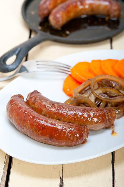istock beef sausages cooked on iron skillet 467120616