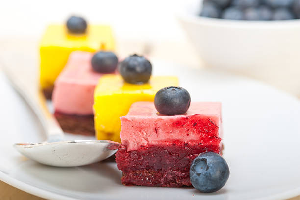 istock strawberry and mango mousse dessert cake 467121538