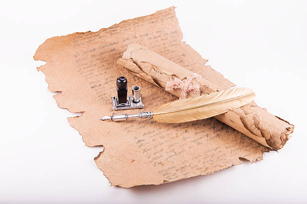 istock Vintage golden pen and ancient manuscripts 467121730