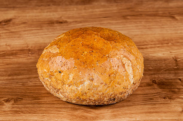 istock fresh bread on the brown wooden table 467123443
