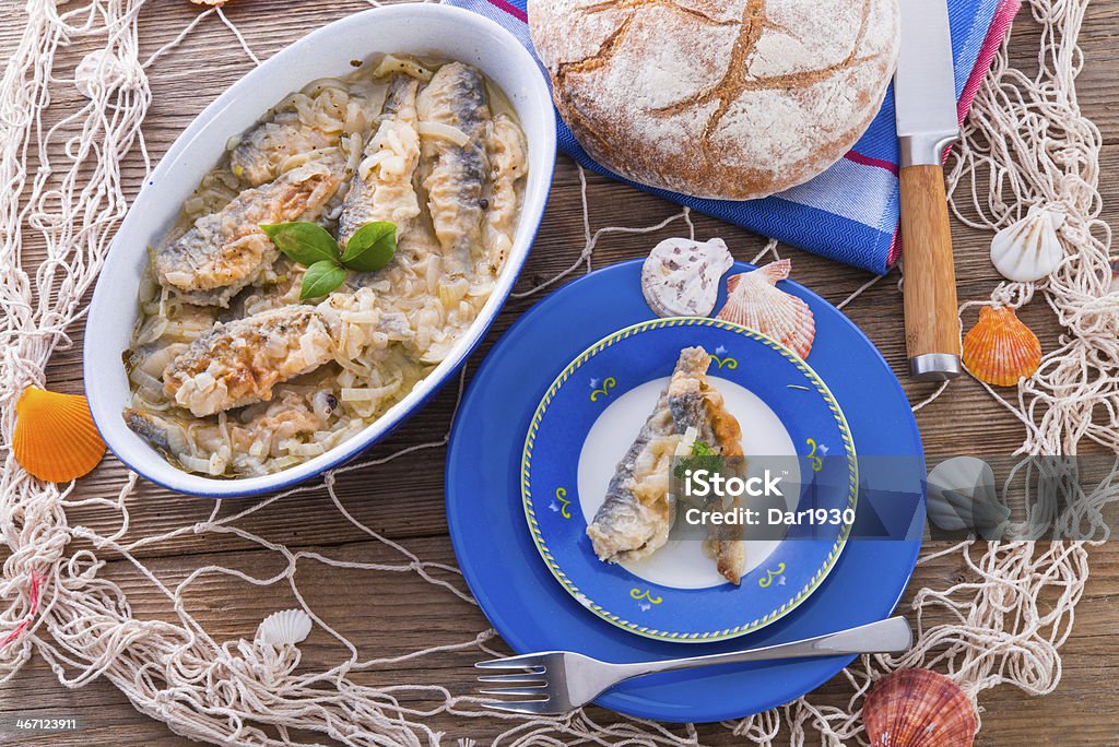 Crossly inlaid fried herrings Crossly inlaid fried herringsCrossly inlaid fried herrings Aioli Stock Photo