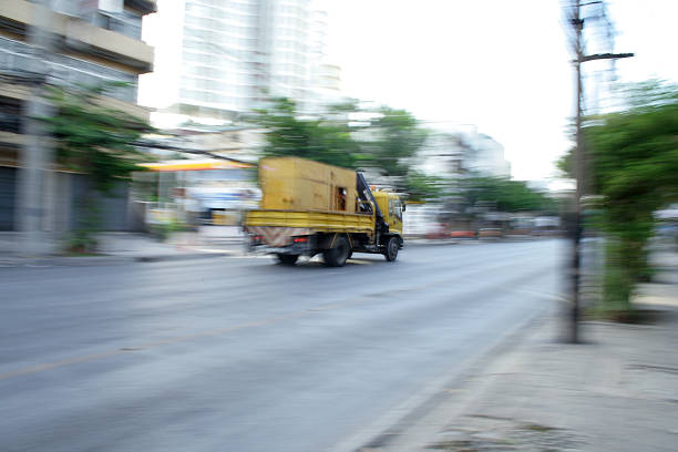 istock Yellow truck on the road 467125117