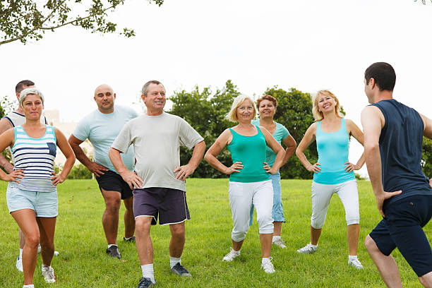 istock Active Mature People with fitness Trainer 467126953