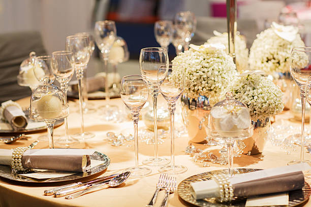 istock Elegant table set in soft creme for wedding event party. 467128177
