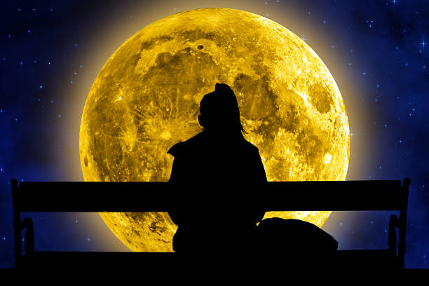istock Girl watching the Moonrise 467128456