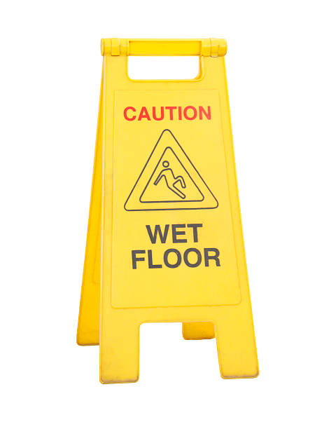 istock caution wet floor signs Isolated on white 467128930