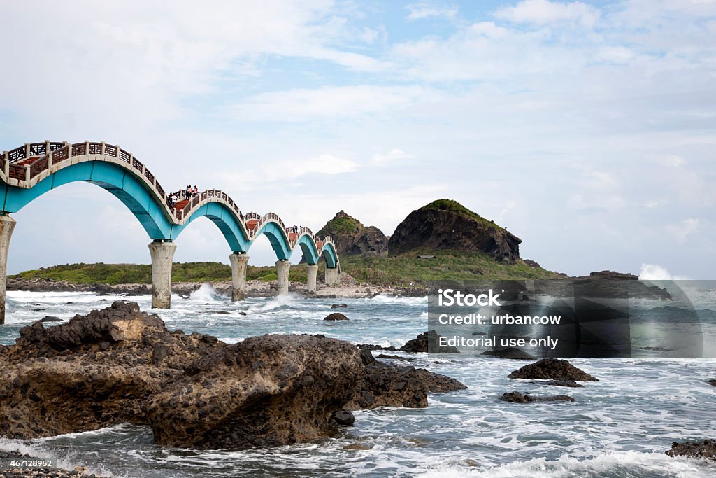 Many arches, Sansiantai Dragon Bridge, Taitung, Taiwan Taitung, Taiwan - November 16, 2014: Visitors walk across the Sansiantai Dragon Bridge to Sanxiantai Island, Taitung, Taiwan 2015 Stock Photo