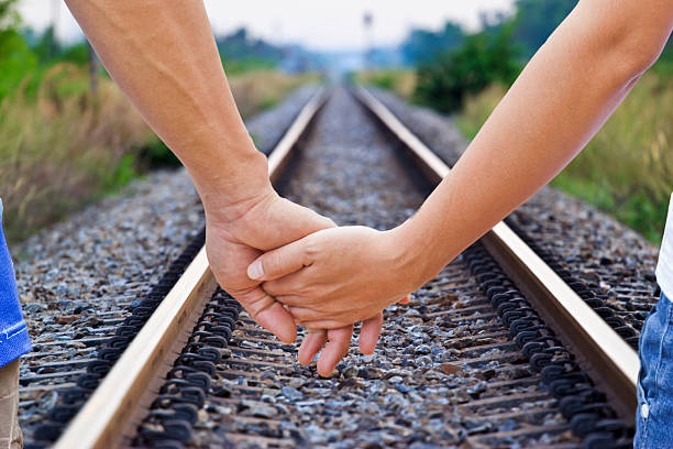 istock lover travels,straight railroad track 467130651