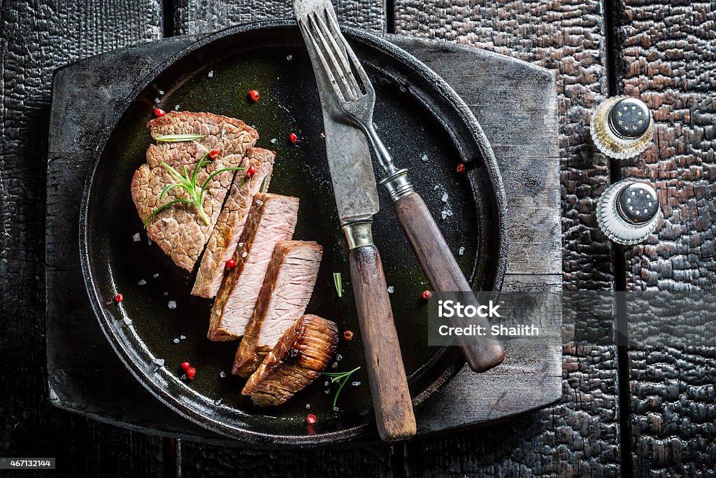 Hot meat with fresh herbs ready to eat Hot meat with fresh herbs ready to eat. 2015 Stock Photo