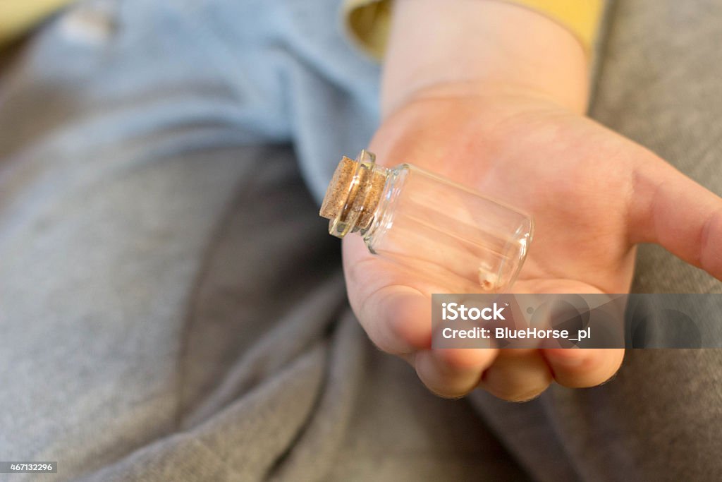 Plucked milk tooth The boy shows his first lost milk tooth 2015 Stock Photo