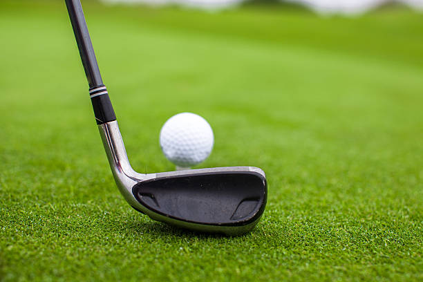 istock Golf stick and ball on green grass 467133037