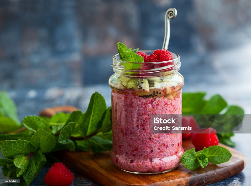 Chia and raspberry pudding Raspberry and chia seeds pudding in jar for breakfast 2015 Stock Photo