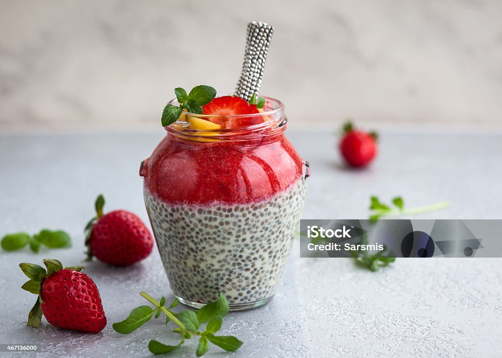 Chia and strawberry pudding Strawberry and chia seeds pudding in a jar for breakfast 2015 Stock Photo