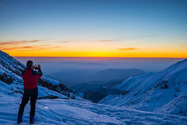 istock Alpinist taking selfie at twilight 467139248