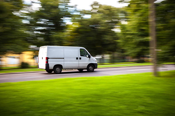 istock Delivery van moves on road 467139318