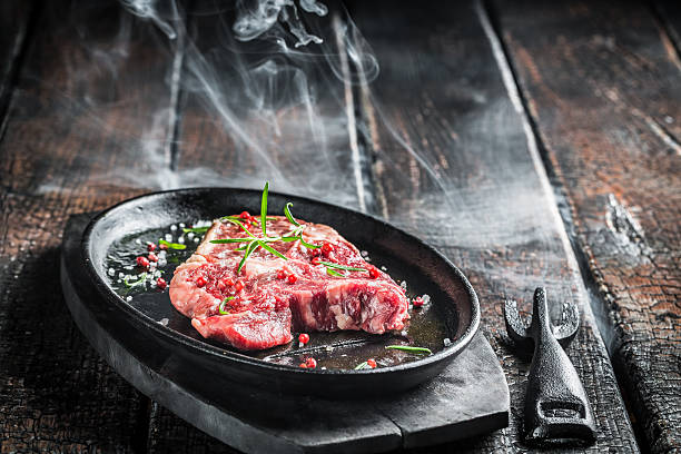 istock Grilling red meat with rosemary 467140154