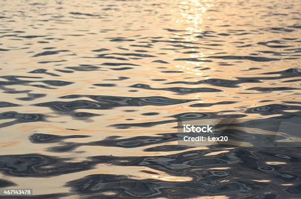 Mercury Waves Background With Selective Focus And Sunlight Stock Photo - Download Image Now