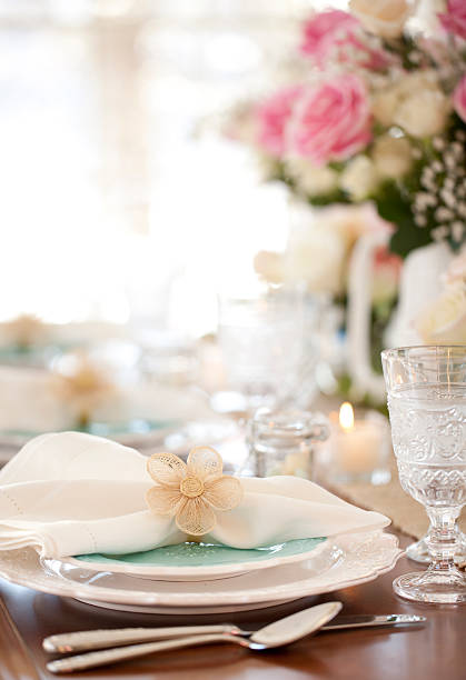 Easter, Mother's day or wedding special occasion dining.  Spring, elegant and a bit rustic dining table place setting with beautiful floral centerpiece arrangements.