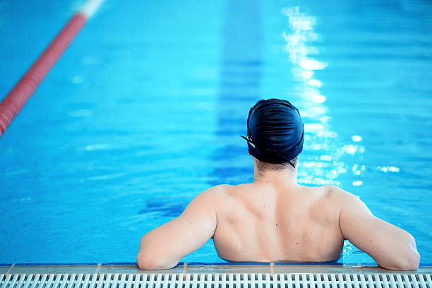 istock Young man in swimming pool 467143606