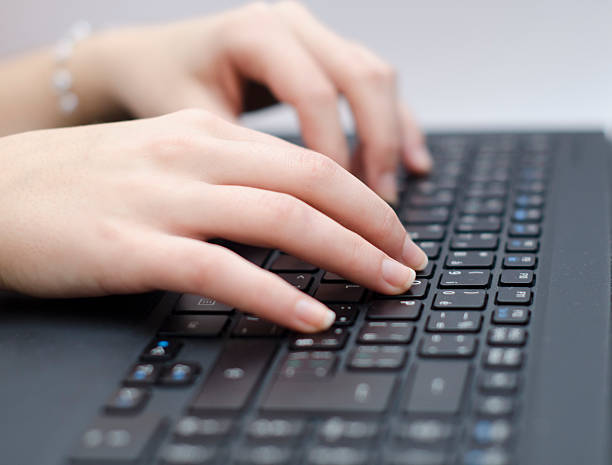 istock woman hands on the keyboard 467144350