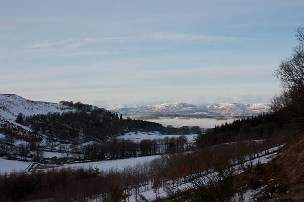 istock Snow-covered farmland and mountain 467146105