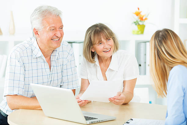 istock Senior Couple Meeting with Financial advisor. 467146523