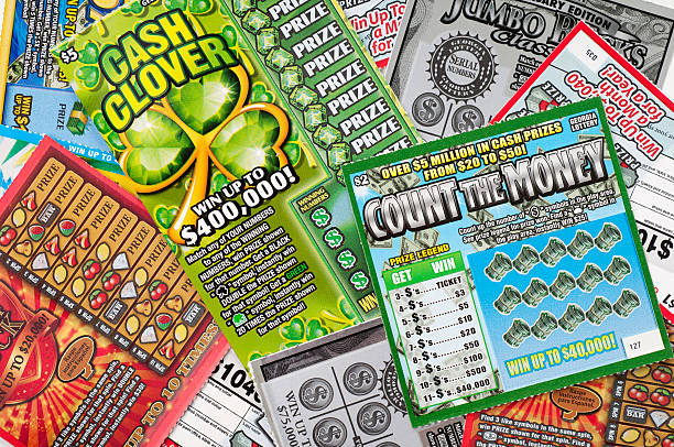 Georgia Lottery Tickets Alpharetta, GA, USA - January 31, 2014 - A large assortment of $1, $2, and $5 Georgia lottery scratch-off tickets.  The Georgia lottery uses the proceeds from sales to fund local education. georgia us state photos stock pictures, royalty-free photos & images
